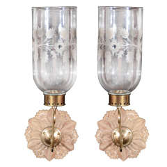 Carved wood and brass sconces with etched glass hurricane shades