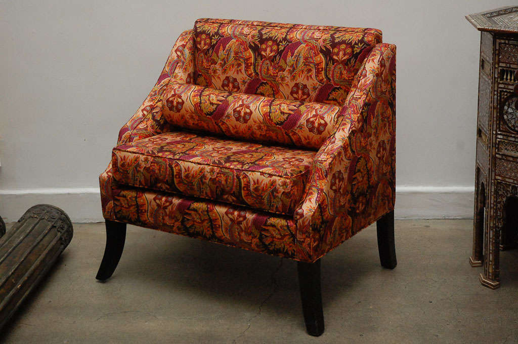 Pair of modern Moroccan small settees with small roll cushion in Tony Duquette style, very nice armchairs.
Bohemian orange multi-color fabric with happy bold colors.
One of a kind pair of custom Moorish club chairs.
Measures: Depth of seat is 18
