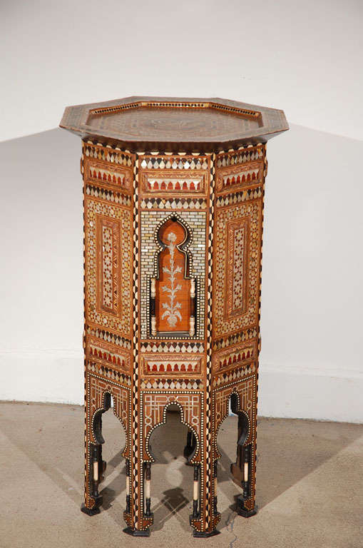 Outstanding very rare to find pair of Ottoman Syrian Mosaic-Work Pedestal tables inlaid with mother of pearl, tortoise shell, ebony and ivory, very fine craftsmanship that inspired Carlo Bugatti.

Octagonal top with a raised rim supported on 8
