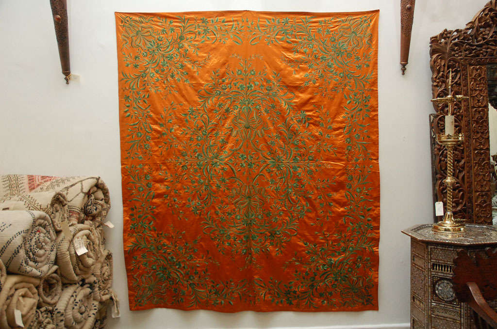 An antique Ottoman Empire textile, rich burnt orange silk velvet with green embroidered.
Wonderful decorative and historical artifact dating to the late 19th century textile. This dramatic embroidered of meandering botanical's are done in earthy