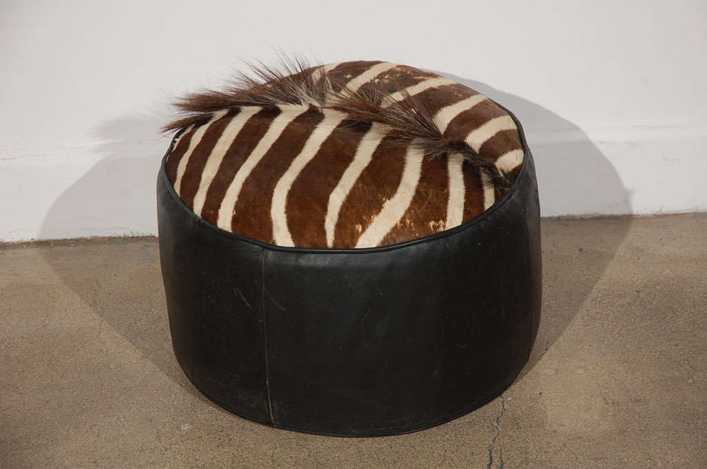 Very nice unusual leather pouf, footstool with zebra top.
Use it as an ottoman or accent pouf.

We specialise in Moorish, Moroccan, Middle Eastern, Islamic Art and African Antiques, Levantine, Tony Duquette, Carlo Bugatti Style. Mosaik provides