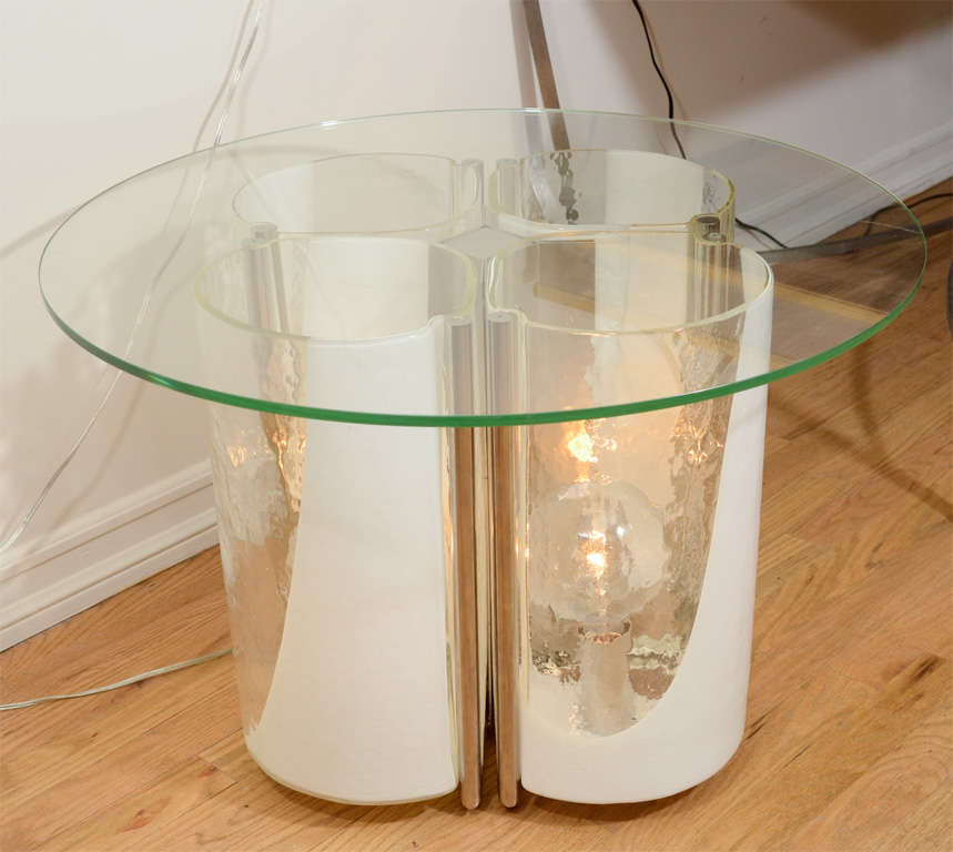 Interior lit clear and lattimo glass occasional table by Vistosi.

View our complete collection at www.johnsalibello.com