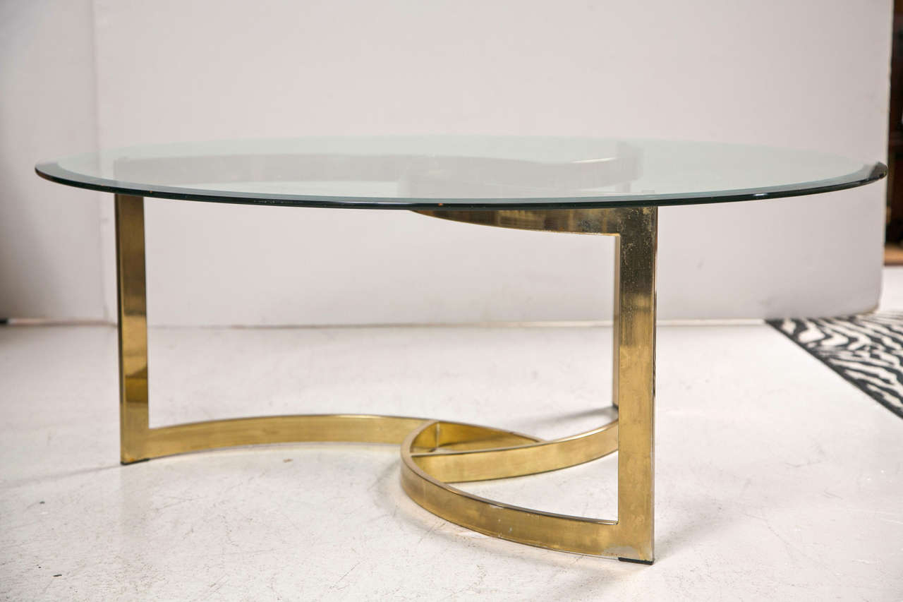 round glass and brass coffee table