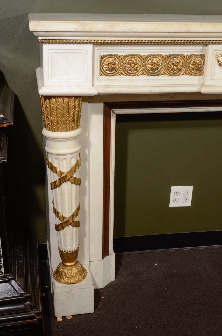 Hand-Carved Palatial Antique French Louis XVI Style White Marble and Gilt Bronze Mantle For Sale