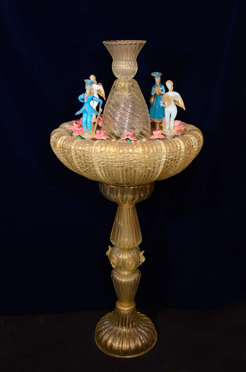 A Magnificent and Large Antique Italian Murano glass fountain of exquisite craftsmanship. This unique Murano glass figural fountain is a superb piece of artistry, the craftsmanship of Murano glass makers with the functionality of a water fountain is