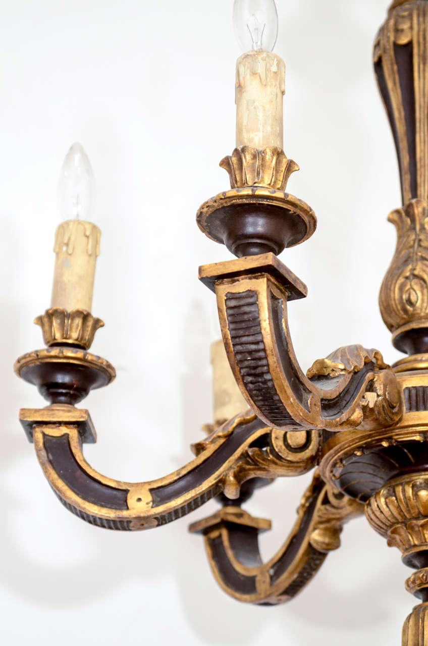 Swedish Baroque Style Ebonized and Gilt Wooden Chandelier