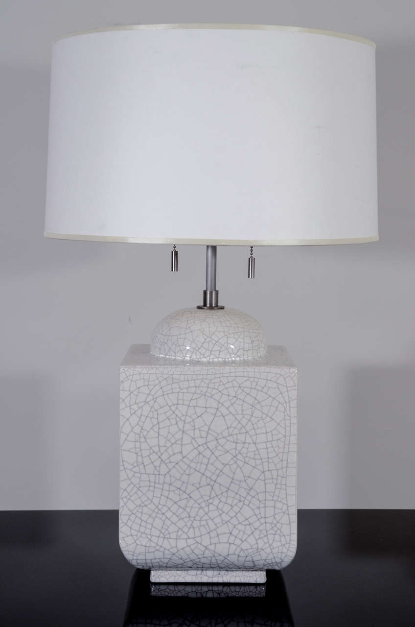 Square molded ceramic table lamp. Cream crackle glaze.