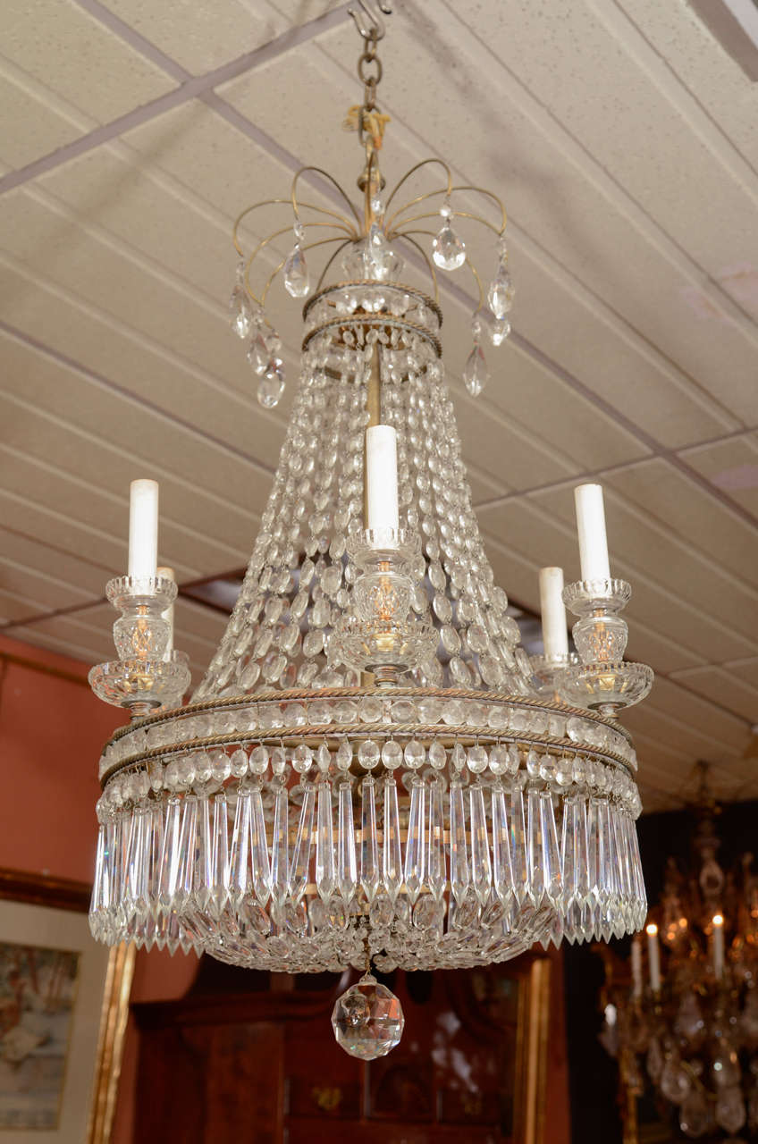 A fine Regency style crystal and bronze six-light chandelier.