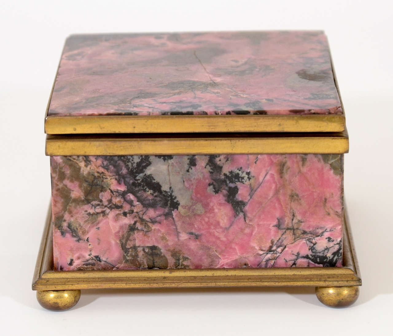 Vintage Pink Malachite (Rhodochrosite) and Bronze Jewelry Box Raised on Ball Feet with a Hinged Lift Top; Interior Lined in Wood.  Early 20th Century

4.5 inches wide x 4.5 inches deep x 2.75 inches high