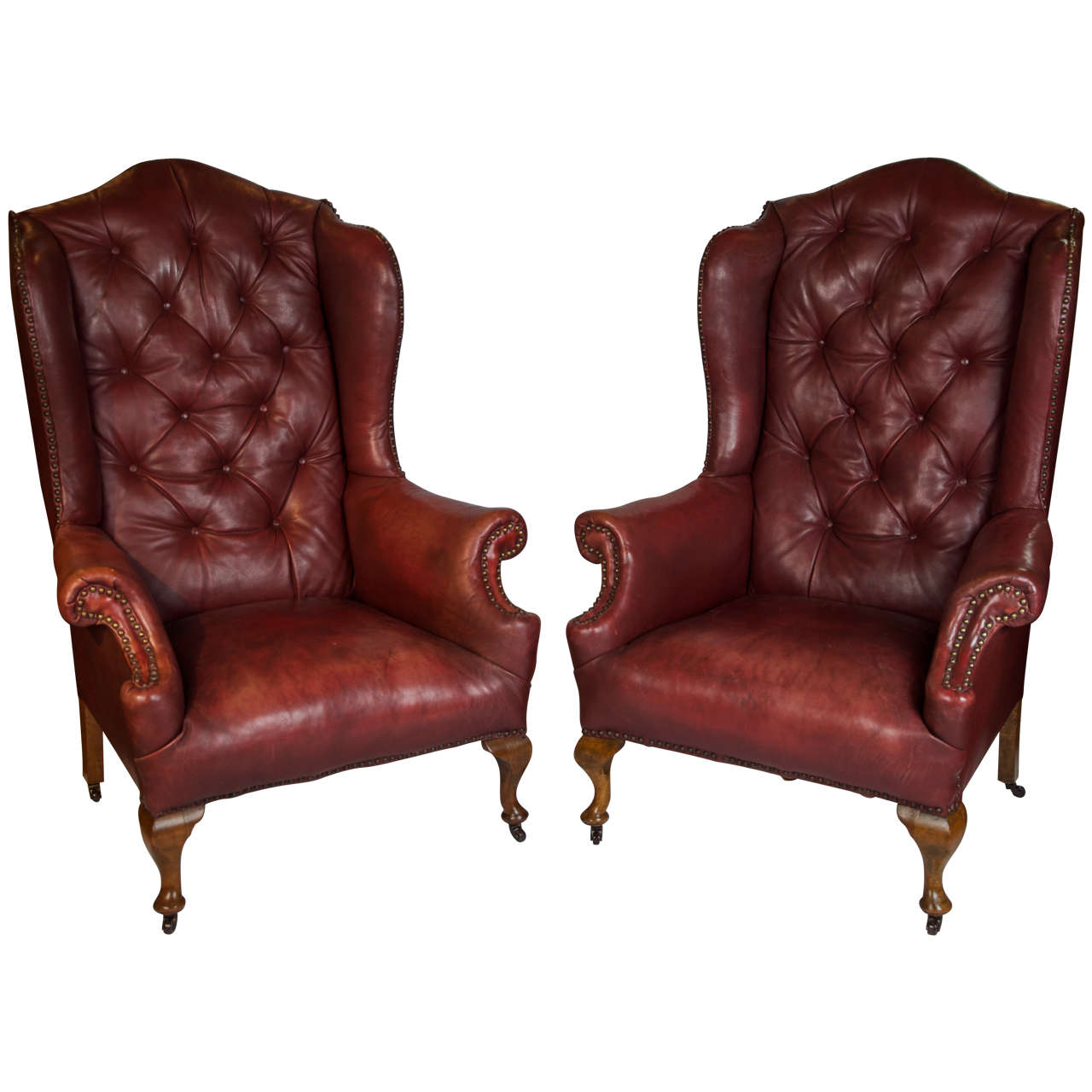 Pair of Early 20th Century Red Leather Wing Back Chairs