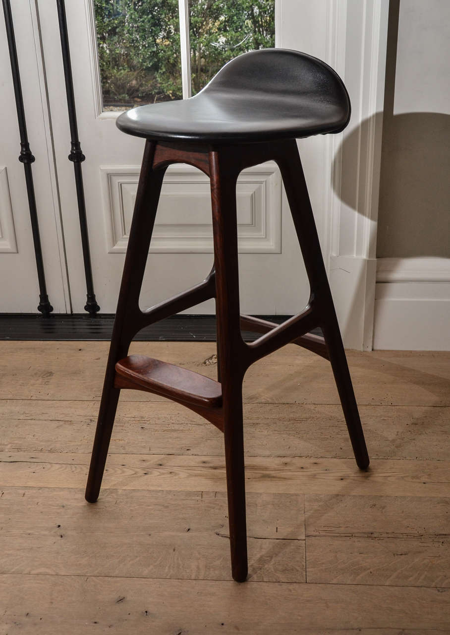 Stunning 1960's Eric Buck Barstool in rosewood and newly upholstered in black leather. we have 7 available