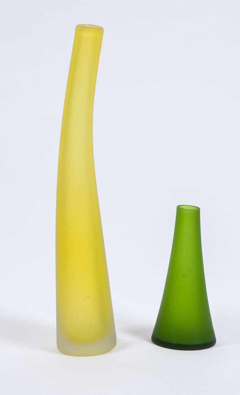 Set of two frosted glass vases.  Carlo Moretti for Rosenthal Netter.  One vase is signed with sticker to base.  Italy, circa 1960.  One vase is green, the other is yellow.  

Dimensions (smaller vase):
7.25 inch height
3.5 inch width at