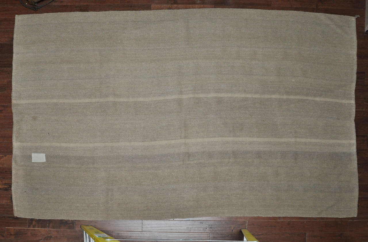 20th Century Linen and Cotton Rug from Turkey.This casual rug was woven in Turkey using vintage yarns. Rug was found in the south of France.
