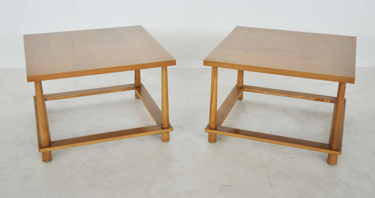 Pair of end tables by T.H. Robsjohn-Gibbings.
