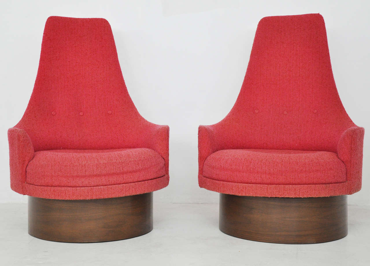 High back swivel chairs by Adrian Pearsall. Refinished walnut bases.