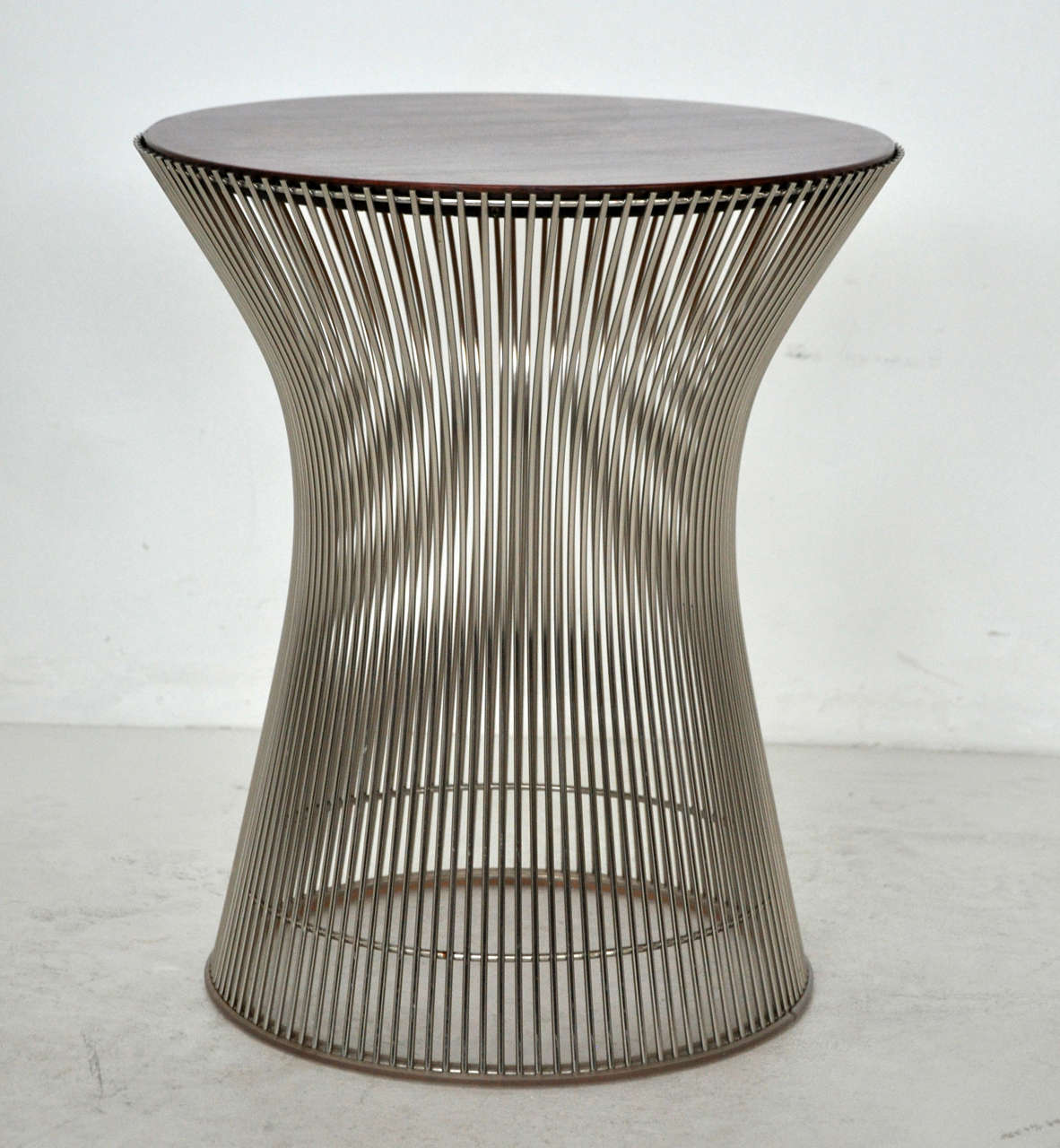 Nickel base side table with rosewood top. Beautiful wood grain. Designed by Warren Platner for Knoll.