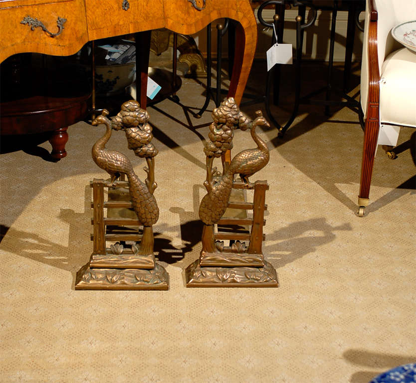 PAIR OF ART NOUVEAU BRASS PEACOCK ANDIRONS<br />
AN ATLANTA RESOURCE FOR FINE ANTIQUES<br />
WE HAVE A VERY LARGE INVENTORY ON OUR WEBSITE<br />
TO VISIT GO TO WWW.PARCMONCEAU.COM