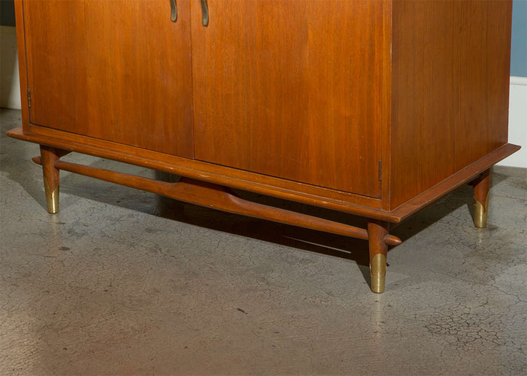 Mid-Century Lane china cabinet with sliding glass doors above and wood doors below.