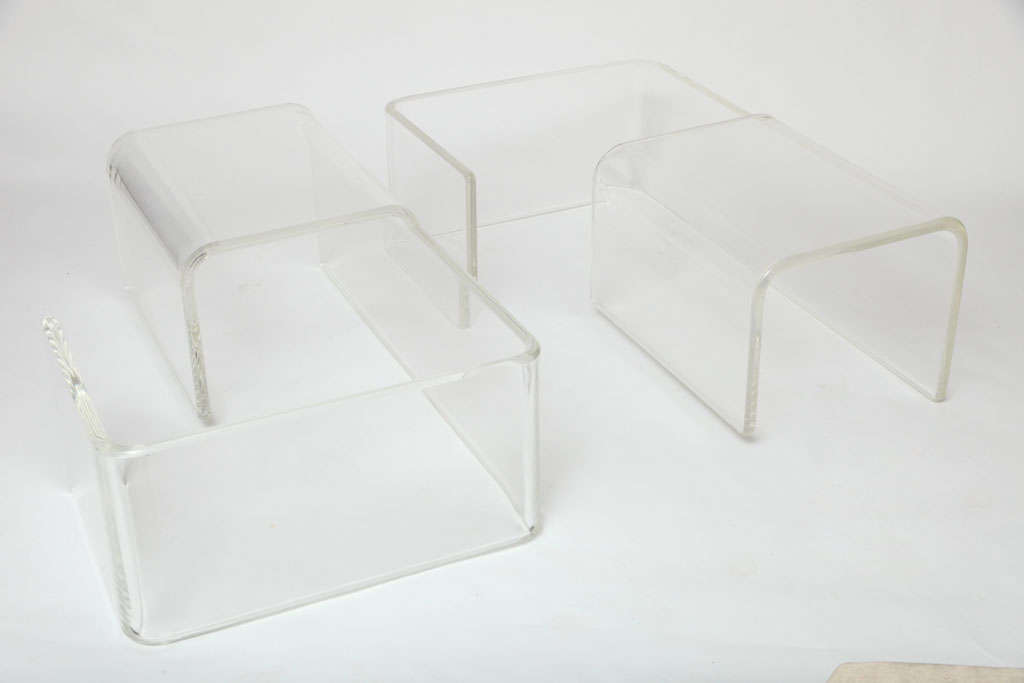 Modular Lucite tables,can be used as end tables or coffee tables.
Very thick Lucite