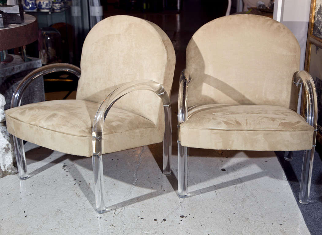 Talk about modern chic!  These great reupholstered suede chairs add a dash of unique swanky stlye to your office or living room.