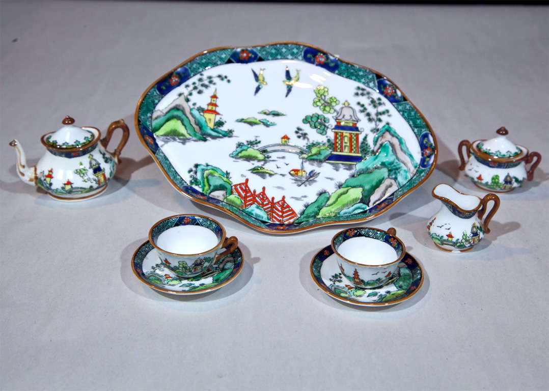 This sweet Staffordshire set of miniatures would be a beautiful gift or addition to your private collection!  With its bright picturesque patterns and lovingly crafted shapes, this set is a darling example of exquisite early 20th Century