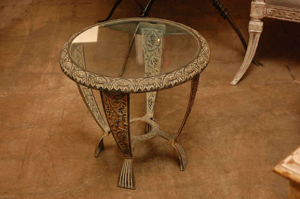 Small glass top Seville art metal studio side table.