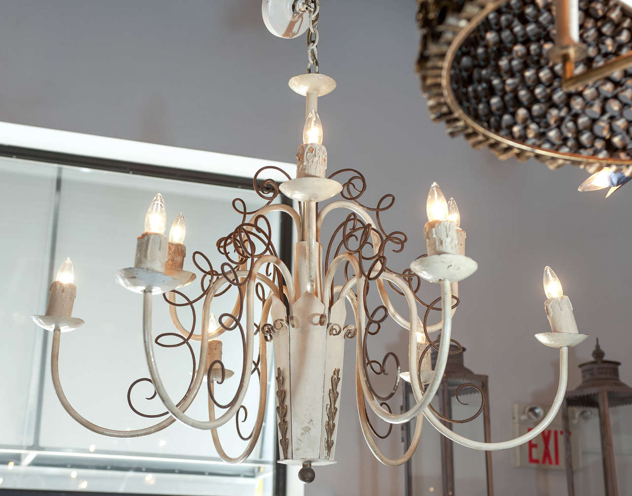 20th century French moderne nine-arm chandelier in style of Jules Leleu, Paris, circa 1940. Restored and rewired.