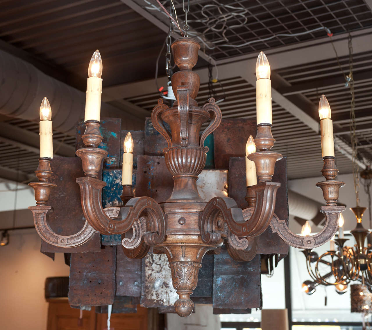 20th century exceptionally carved wooden six-branch chandelier rewired and restored, circa 1940, Belgium.