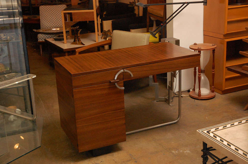 Very nice desk made by Herman Miller and designed by Gilbert Rohde in a exotic and rare a East india laurel wood.