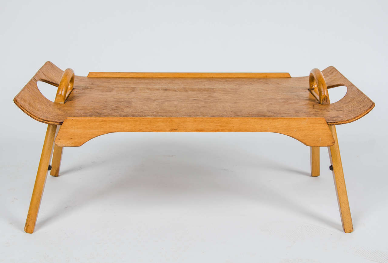 A Danish 1950s wooden folding serving tray.

Origin Denmark. Maker unknown.