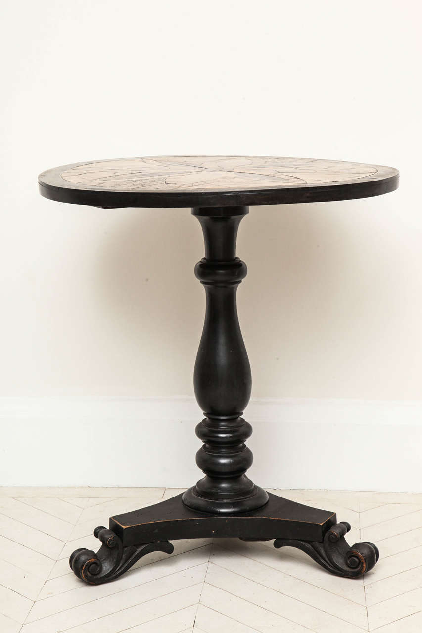 A mid-19th century Anglo-Indian side table with specimen wood top including walnut, padouk, ebony and palm woods inlaid in a sunburst pattern