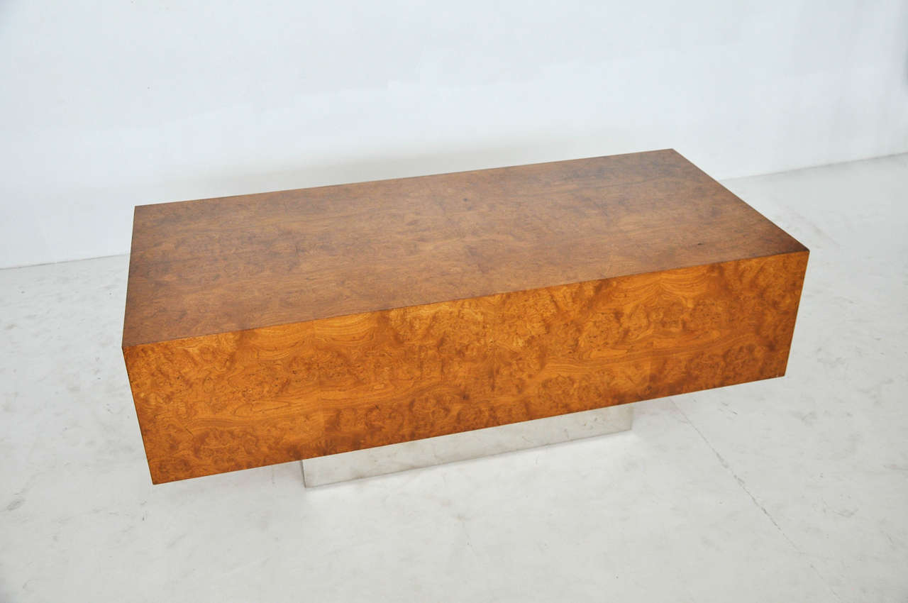 Eppinger Furniture NY desk, circa 1970s. Highest quality construction. Burl wood case appears to float on polish chrome pedestal.

Matching credenza available.