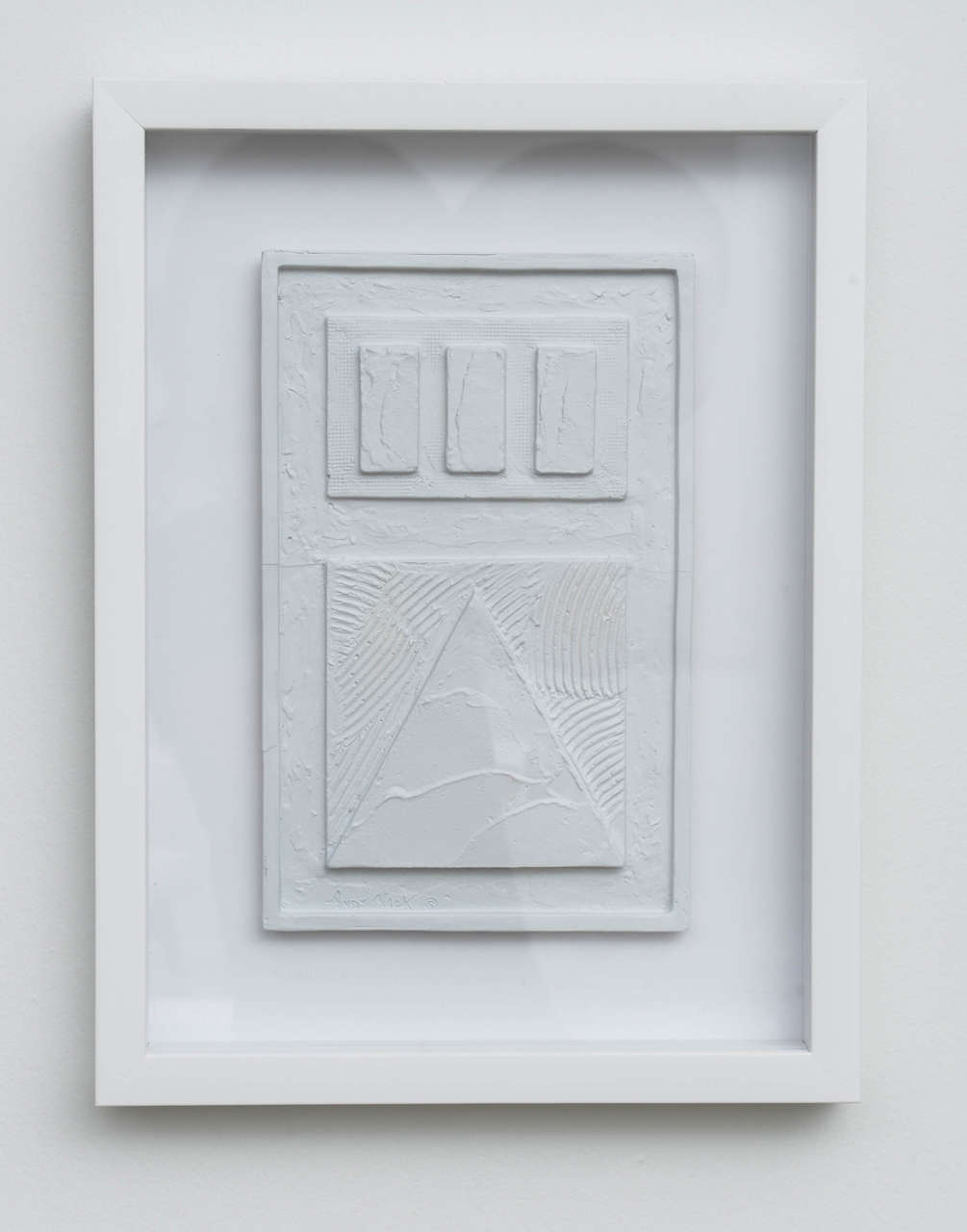 A fun, geometric, plastered wall relief framed with shadowbox.

White matte plaster finish. 

Two available, priced and shown individually.