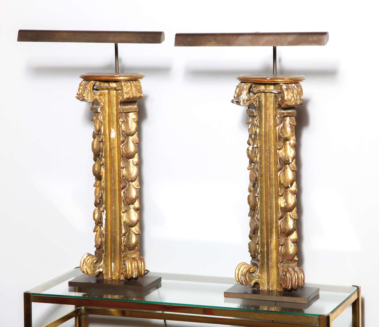 Pair of table lamps made with gilt 18th century architectural elements. The shade and base are made in antique bronze.