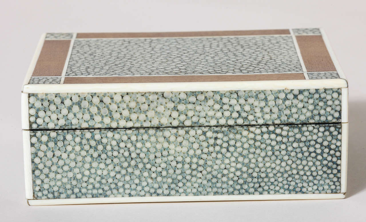 Polished blue shagreen box with bone banding around top, bottom, sides and outlining panels of shagreen and cedar on the top. Shagreen underside.