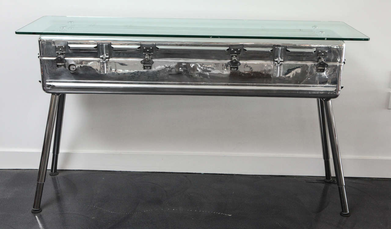polished aluminum vintage missle trunk made into console table