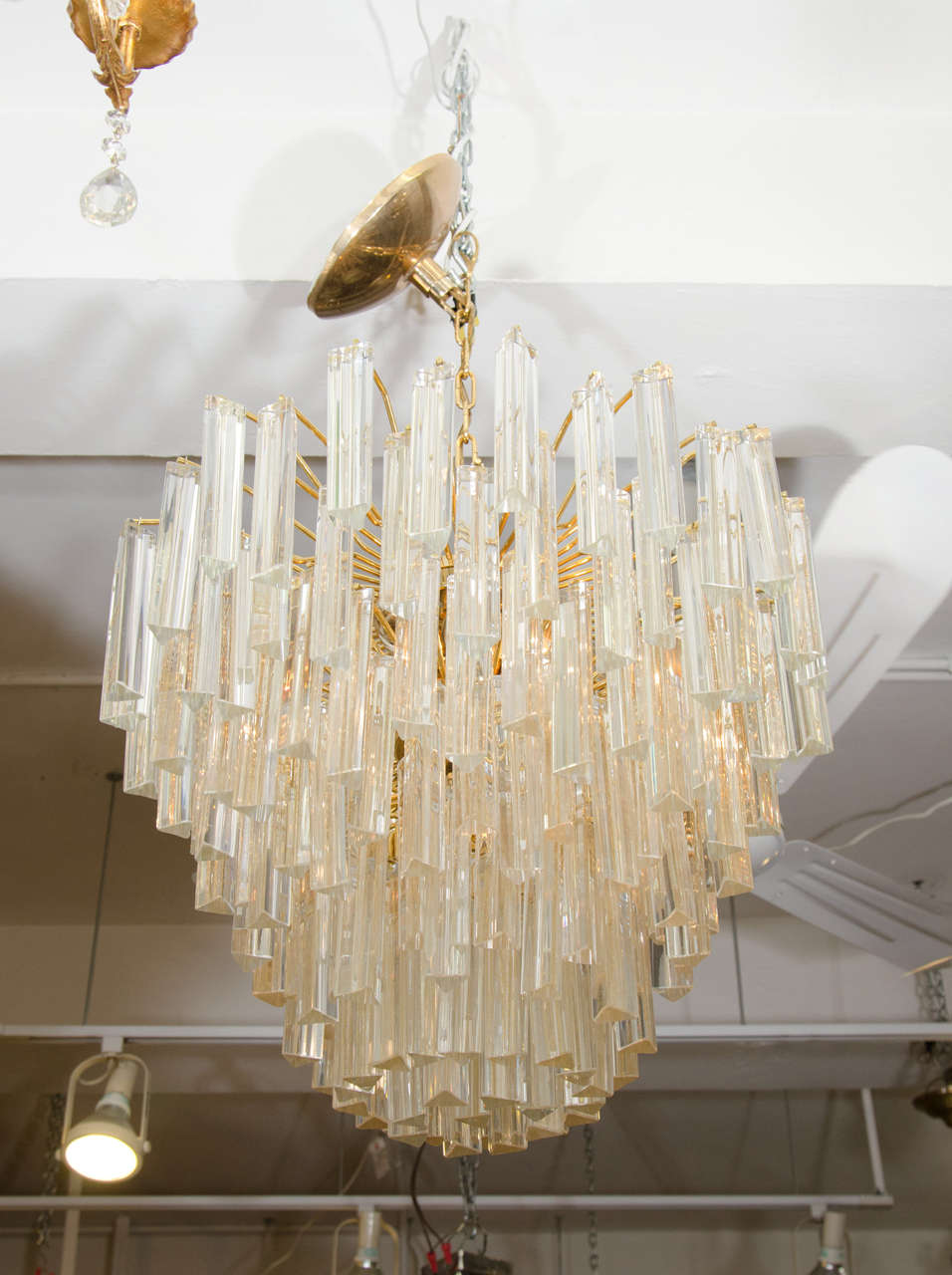 Rare Size Venini Murano gold dust glass pendant chandelier, Very Fine Quality and Radiating Frame and Original Fine Gold Plated Canopy,The Fixture is fitted for six standard base chandelier bulbs.

Matching sconces are available for purchase