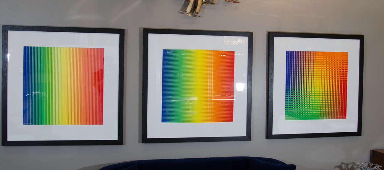 A vintage set of three multi-colored Op Art silk screen prints framed in a black painted wood frame by Getulio Alviani. All three are signed at the bottom right corner.

Good vintage condition with age appropriate wear.