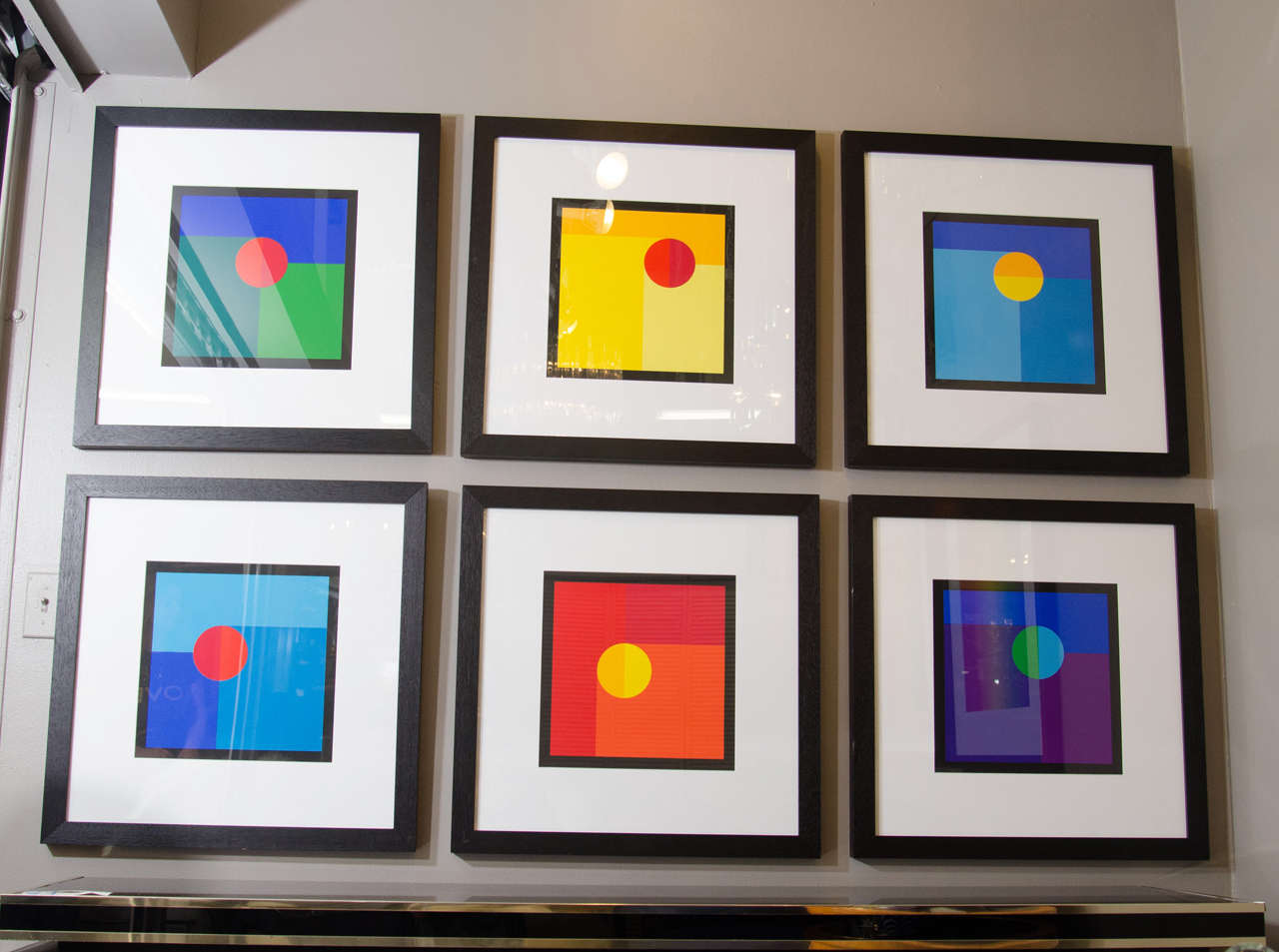 A vintage set of six geometric, colorful, silk screens by German artist Jo Niemeyer. These works draw upon early 20th century De Stijl ideas and the works of Piet Mondrian and Theo van Doesburg.

Overall good vintage condition. Two of the frames
