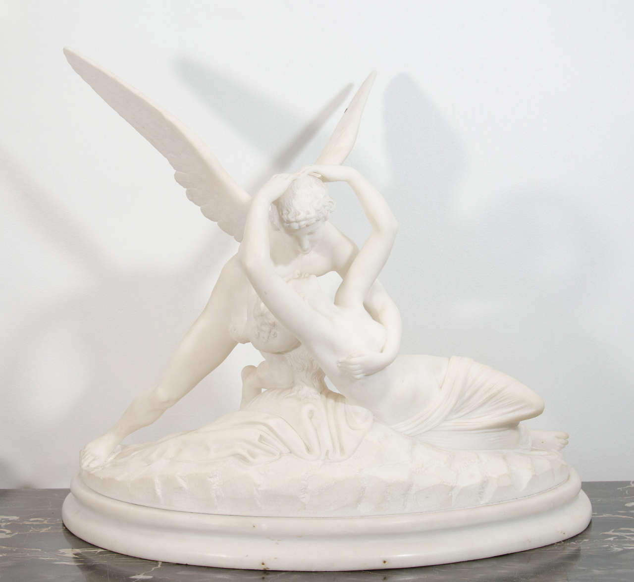 An antique solid marble sculpture of Cupid and Psyche after Antonio Canova made in the 9th century.

Good condition with age appropriate wear.

Reduced from: $2500