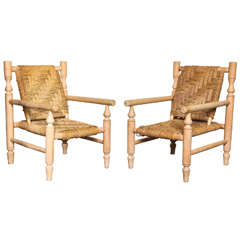 Pair of 1950s French Armchairs in the style of Charlotte Perriand