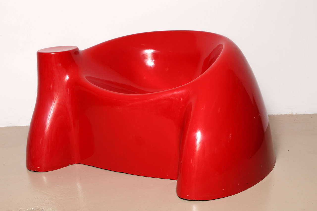 Iconic fiberglass chair from Wendell Castle's Molar Series in very desirable red color. This piece was designed in 1969 as an open editioned piece.