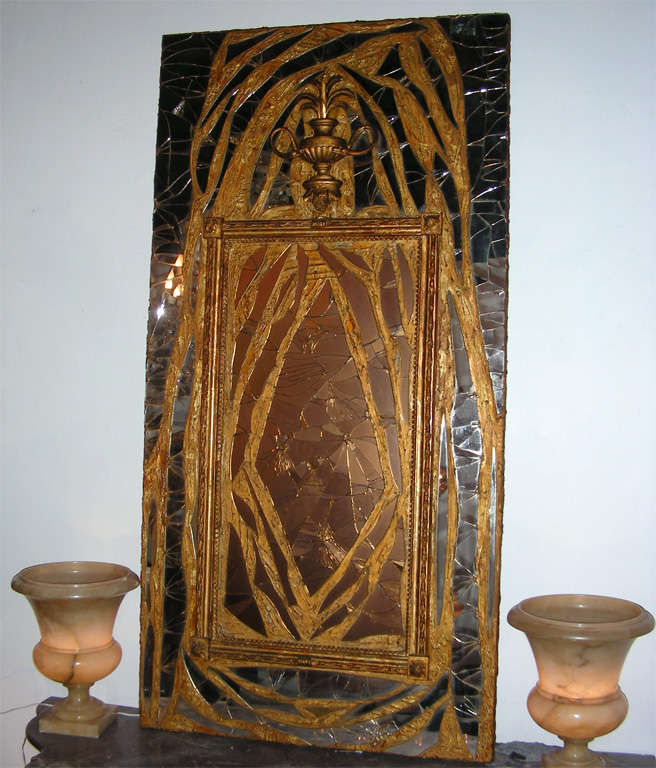 1970s trumeau by Jean-Claude Mazeron, composed of wood and mirror elements,  with the insertion of a Louis XVI period gilded wood frame. Glued on a canvas set on a stretcher.