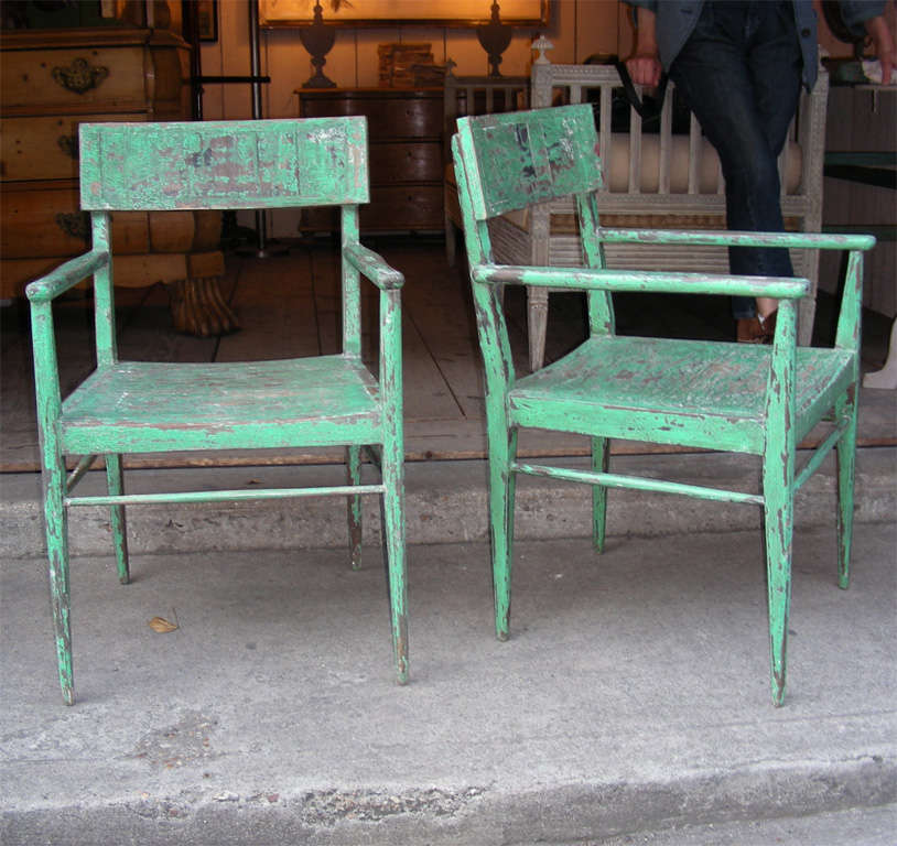 Two 1920s Dutch chairs in wood, with green patina.