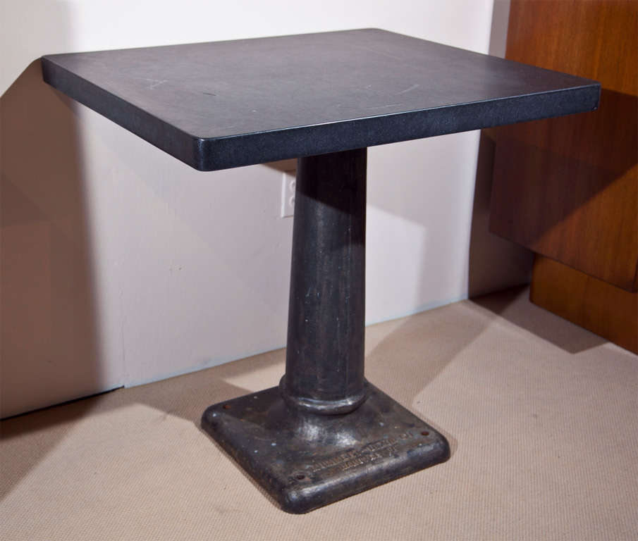 An industrial steel console table.