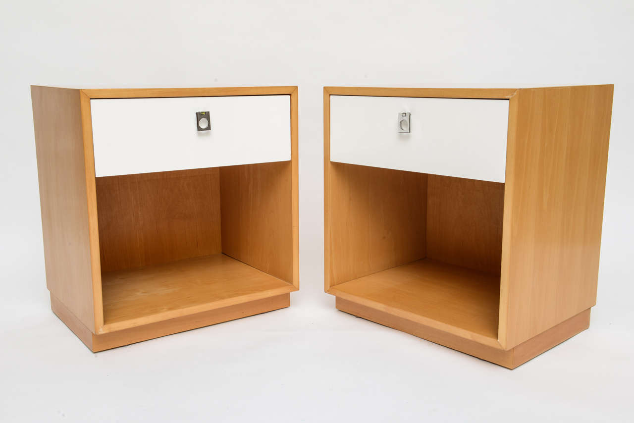 SOLD  Modern & minimalist in design this pair of Nightstands designed by Jack Cartwright for Founders Furniture has clean lines and quiet excitement with the lustrous clear lacquered birch wood and the white lacquered drawer fronts with great modern
