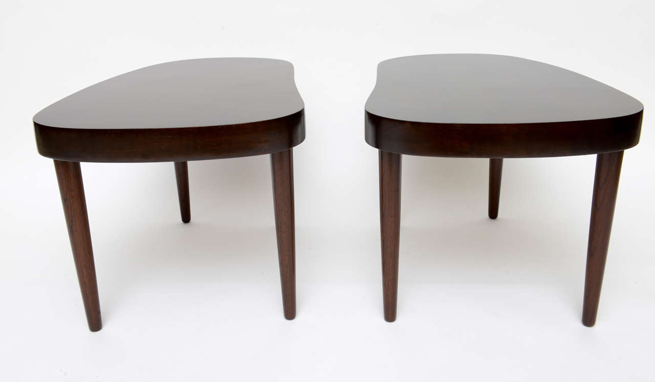 SOLD 9/14  Magnificent cabinetry from Povl Dinesen of Denmark, early to mid 1950s in a deep apron top style kidney shaped tables with lathe turned tapering legs.  The shape sometimes referred to as amoeba shaped or biomorphic.  The table are