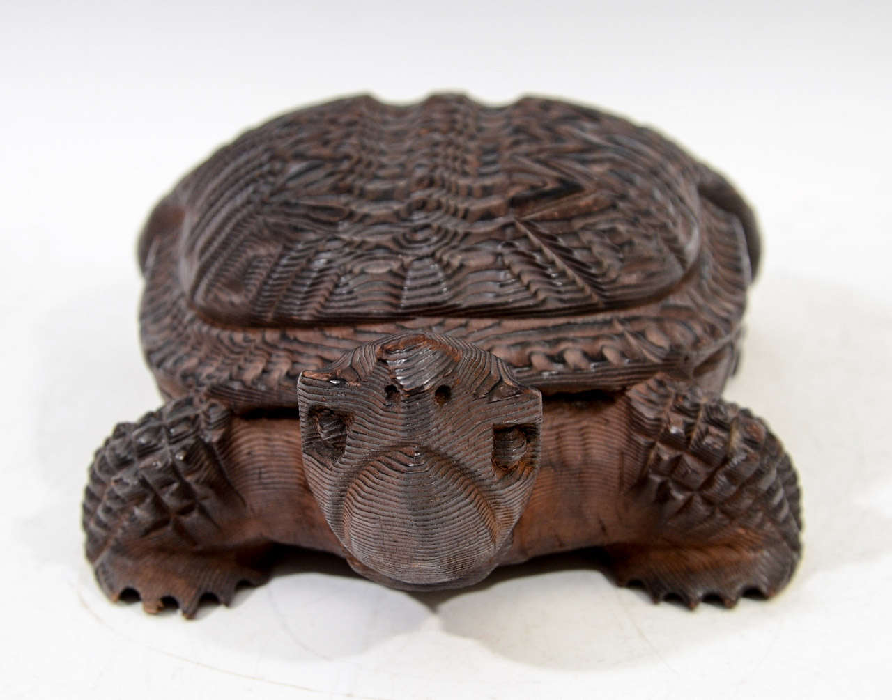 A Japanese Meiji Period late 19th, early 20th century carved boxwood turtle okimono