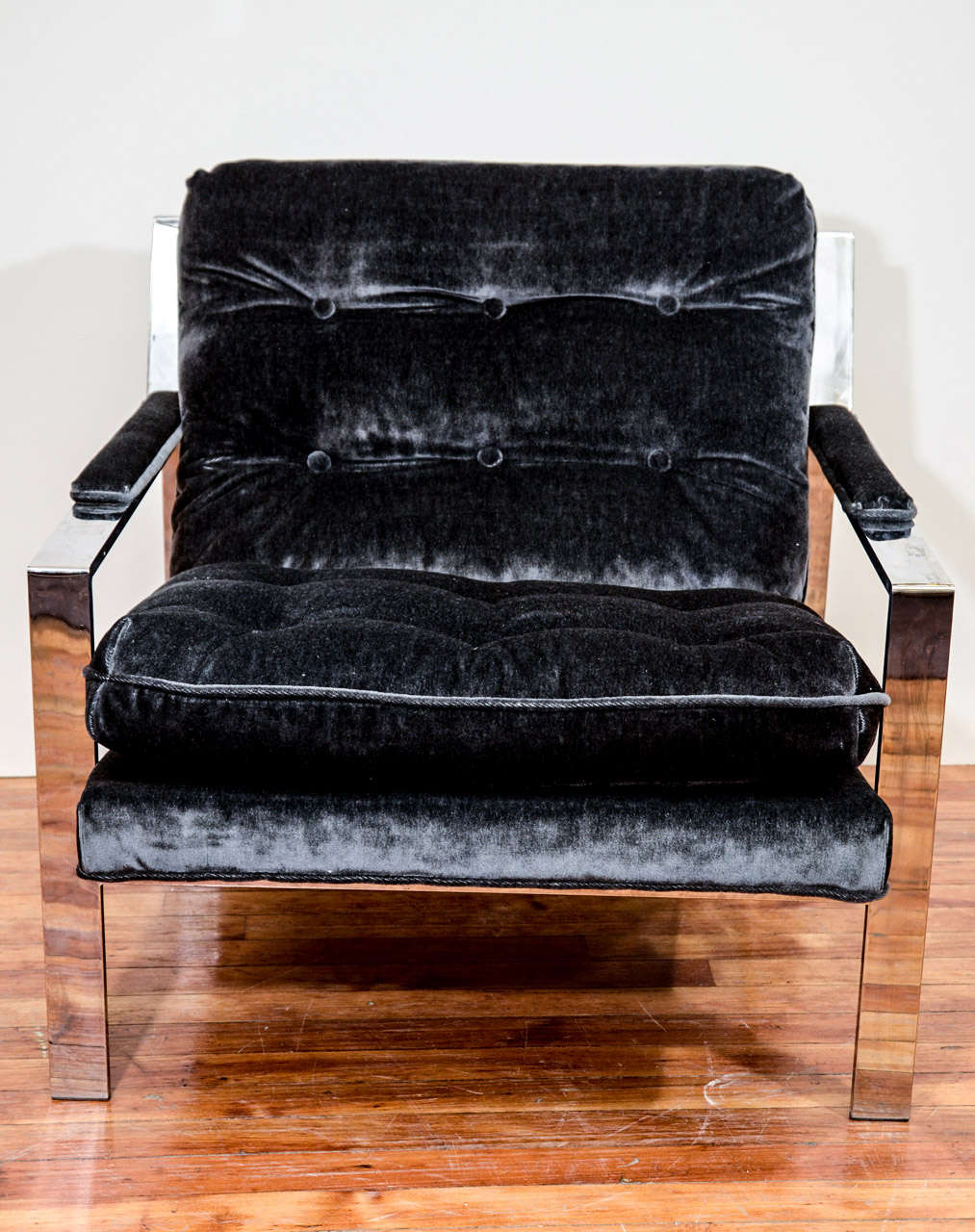 A pair of vintage Milo Baughman chairs newly upholstered in charcoal gray mohair with chrome frames.