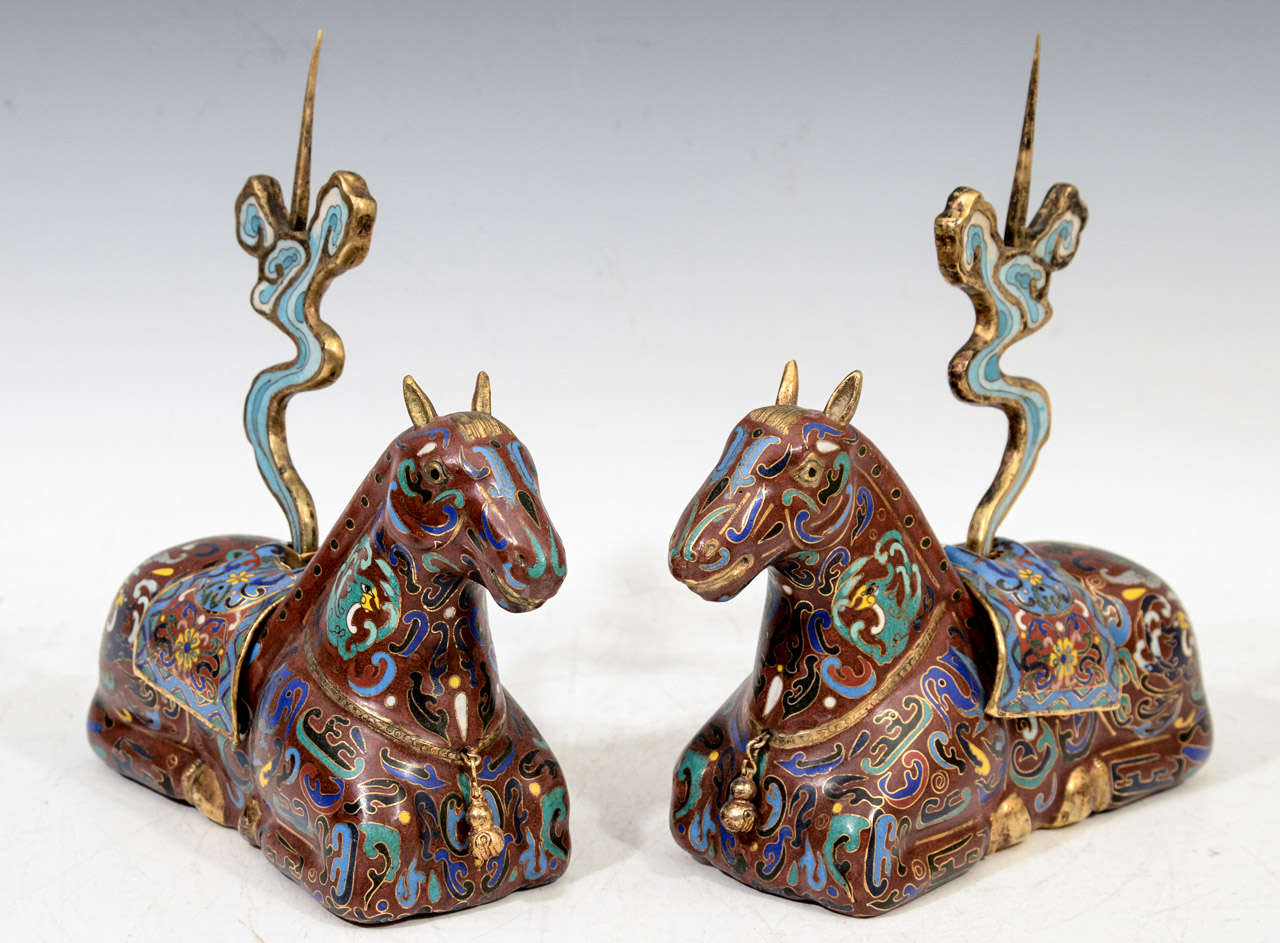 A pair of vintage Chinese horse-form incense holders in brightly colored cloisonne.